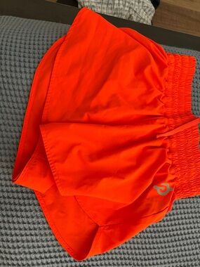 Peloton Women's Bright Orange Athletic Shorts